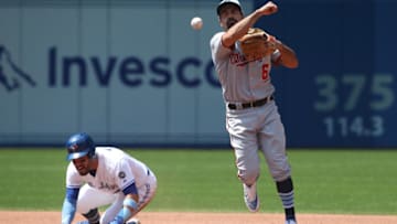 TORONTO, ON - JUNE 17: Anthony Rendon #6 of the Washington Nationals gets the force out of Devon Travis #29 of the Toronto Blue Jays but was not able turn the double play in the fourth inning during MLB game action at Rogers Centre on June 17, 2018 in Toronto, Canada. (Photo by Tom Szczerbowski/Getty Images)