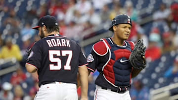 WASHINGTON, DC - JUNE 22 : Starting pitcher Tanner Roark #57 talks with catcher Pedro Severino #29 of the Washington Nationals in the first inning against the Philadelphia Phillies at Nationals Park on June 22, 2018 in Washington, DC. (Photo by Rob Carr/Getty Images)