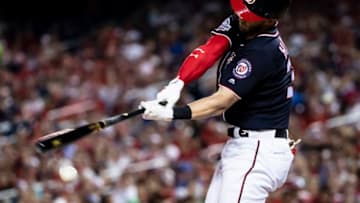 WASHINGTON, DC - JULY 06: Bryce Harper #34 of the Washington Nationals hits a piece of the cover off the ball during the sixth inning against the Miami Marlins inning at Nationals Park on July 06, 2018 in Washington, DC. (Photo by Scott Taetsch/Getty Images)