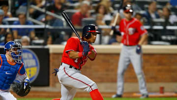 NEW YORK, NY - SEPTEMBER 23: Wilmer Difo #1 of the Washington Nationals follows through on a seventh inning pinch hit single against the New York Mets at Citi Field on September 23, 2017 in the Flushing neighborhood of the Queens borough of New York City. (Photo by Jim McIsaac/Getty Images)