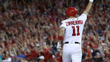 WASHINGTON, DC - OCTOBER 07: Ryan Zimmerman #11 of the Washington Nationals celebrates after hitting a game winning 3 run home run against the Chicago Cubs in the eighth inning during game two of the National League Division Series at Nationals Park on October 7, 2017 in Washington, DC. The Nationals won the game 6-3. (Photo by Win McNamee/Getty Images)