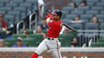 ATLANTA, GA - JUNE 02: Second baseman Wilmer Difo #1 of the Washington Nationals hits an RBI triple in the 14th inning during the game against the Atlanta Braves at SunTrust Park on June 2, 2018 in Atlanta, Georgia. (Photo by Mike Zarrilli/Getty Images)