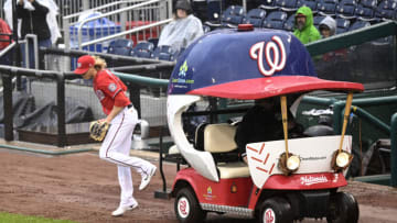 WASHINGTON, DC - OCTOBER 02: Jordan Weems #51 of the Washington Nationals gets off the bullpen cart during the game against the Philadelphia Phillies at Nationals Park on October 02, 2022 in Washington, DC. (Photo by G Fiume/Getty Images)