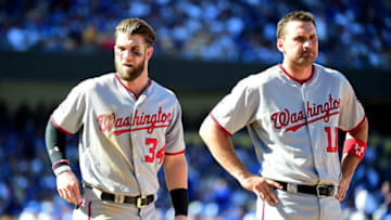 LOS ANGELES, CA - OCTOBER 10: Bryce Harper #34 and Ryan Zimmerman #11 of the Washington Nationals look on while taking on the Los Angeles Dodgers in game three of the National League Division Series at Dodger Stadium on October 10, 2016 in Los Angeles, California. (Photo by Harry How/Getty Images)