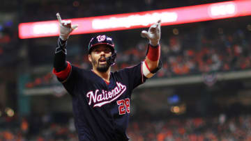 HOUSTON, TEXAS - OCTOBER 23: Kurt Suzuki #28 of the Washington Nationals hits a solo home run against the Houston Astros during the seventh inning in Game Two of the 2019 World Series at Minute Maid Park on October 23, 2019 in Houston, Texas. (Photo by Mike Ehrmann/Getty Images)