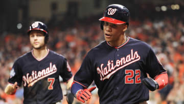 HOUSTON, TEXAS - OCTOBER 23: Trea Turner #7 and Juan Soto #22 of the Washington Nationals score runs on a single by Asdrubal Cabrera (not pictured) against the Houston Astros during the seventh inning in Game Two of the 2019 World Series at Minute Maid Park on October 23, 2019 in Houston, Texas. (Photo by Mike Ehrmann/Getty Images)