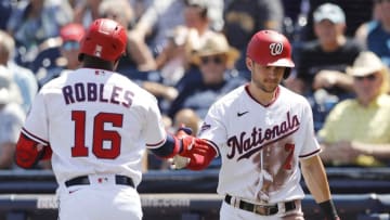 WEST PALM BEACH, FLORIDA - MARCH 12: Victor Robles #16 of the Washington Nationals celebrates with Trea Turner #7 after hitting a solo home run in the third inning against the New York Yankees during a Grapefruit League spring training game at FITTEAM Ballpark of The Palm Beaches on March 12, 2020 in West Palm Beach, Florida. (Photo by Michael Reaves/Getty Images)