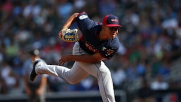 Jul 13, 2014; Minneapolis, MN, USA; World pitcher Julio Urias throws a pitch during the All Star Futures Game at Target Field. Mandatory Credit: Jerry Lai-USA TODAY Sports