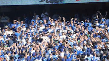 Oct 11, 2016; Los Angeles, CA, USA; Fans go after a foul ball in the game between the Los Angeles Dodgers and the Washington Nationals during game four of the 2016 NLDS playoff baseball series at Dodger Stadium. Mandatory Credit: Gary A. Vasquez-USA TODAY Sports