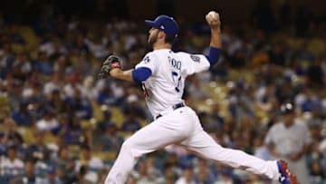 LOS ANGELES, CA - AUGUST 01: Relief pitcher Dylan Floro #51 of the Los Angeles Dodgers pitches in the tenth inning during the MLB game against the Milwaukee Brewers at Dodger Stadium on August 1, 2018 in Los Angeles, California. The Dodgers defeated the Brewers 6-4. (Photo by Victor Decolongon/Getty Images)
