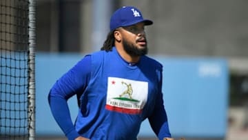 LOS ANGELES, CA - AUGUST 25: Kenley Jansen #74 of the Los Angeles Dodgers wwarms up before playing the San Diego Padres at Dodger Stadium on August 25, 2018 in Los Angeles, California. All players across MLB will wear nicknames on their backs as well as colorful, non-traditional uniforms featuring alternate designs inspired by youth-league uniforms during Players Weekend. (Photo by John McCoy/Getty Images)