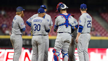 CINCINNATI, OH - SEPTEMBER 10: Manager Dave Roberts #30 of the Los Angeles Dodgers talks to his team in the fourth inning against the Cincinnati Reds at Great American Ball Park on September 10, 2018 in Cincinnati, Ohio. (Photo by Justin Casterline/Getty Images)
