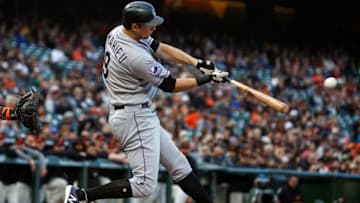 SAN FRANCISCO, CA - SEPTEMBER 15: DJ LeMahieu #9 of the Colorado Rockies hits a double against the San Francisco Giants during the first inning at AT&T Park on September 15, 2018 in San Francisco, California. (Photo by Jason O. Watson/Getty Images)