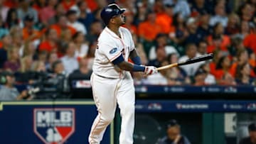 HOUSTON, TX - OCTOBER 05: Martin Maldonado #15 of the Houston Astros hits a solo home run in the seventh inning against the Cleveland Indians during Game One of the American League Division Series at Minute Maid Park on October 5, 2018 in Houston, Texas. (Photo by Bob Levey/Getty Images)