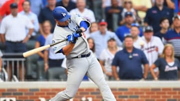 ATLANTA, GA - OCTOBER 08: David Freese #25 of the Los Angeles Dodgers hits a two run RBI single during the sixth inning of Game Four of the National League Division Series against the Atlanta Braves at Turner Field on October 8, 2018 in Atlanta, Georgia. (Photo by Scott Cunningham/Getty Images)
