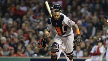 BOSTON, MA - OCTOBER 14: Martin Maldonado #15 of the Houston Astros fields a past ball during the seventh inning against the Boston Red Sox in Game Two of the American League Championship Series at Fenway Park on October 14, 2018 in Boston, Massachusetts. (Photo by Elsa/Getty Images)