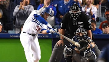 LOS ANGELES, CA - OCTOBER 16: Max Muncy #13 of the Los Angeles Dodgers singles in the eighth inning off Josh Hader #71 of the Milwaukee Brewers (not pictured) in Game Four of the National League Championship Series at Dodger Stadium on October 16, 2018 in Los Angeles, California. (Photo by Kevork Djansezian/Getty Images)