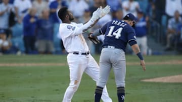 LOS ANGELES, CA - OCTOBER 17: Yasiel Puig #66 of the Los Angeles Dodgers reacts after hitting a double during the eighth inning against the Milwaukee Brewers in Game Five of the National League Championship Series at Dodger Stadium on October 17, 2018 in Los Angeles, California. (Photo by Jeff Gross/Getty Images)