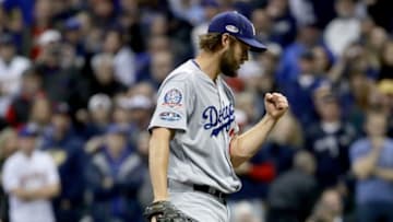 MILWAUKEE, WI - OCTOBER 20: Clayton Kershaw #22 of the Los Angeles Dodgers celebrates after defeating the Milwaukee Brewers in Game Seven to win the National League Championship Series at Miller Park on October 20, 2018 in Milwaukee, Wisconsin. (Photo by Jonathan Daniel/Getty Images)