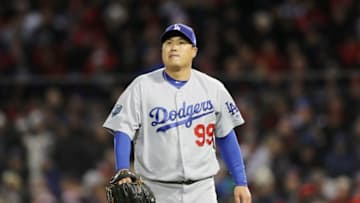 BOSTON, MA - OCTOBER 24: Hyun-Jin Ryu #99 of the Los Angeles Dodgers reacts after retiring the side during the fourth inning against the Boston Red Sox in Game Two of the 2018 World Series at Fenway Park on October 24, 2018 in Boston, Massachusetts. (Photo by Elsa/Getty Images)