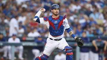 LOS ANGELES, CA - OCTOBER 26: Yasmani Grandal #9 of the Los Angeles Dodgers throws out the runner during the second inning against the Boston Red Sox in Game Three of the 2018 World Series at Dodger Stadium on October 26, 2018 in Los Angeles, California. (Photo by Ezra Shaw/Getty Images)