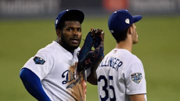LOS ANGELES, CA - OCTOBER 27: Yasiel Puig #66 talks with Cody Bellinger #35 during Game Four of the 2018 World Series against the Boston Red Sox at Dodger Stadium on October 27, 2018 in Los Angeles, California. (Photo by Kevork Djansezian/Getty Images)