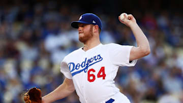 LOS ANGELES, CALIFORNIA - APRIL 13: Caleb Ferguson #64 of the Los Angeles Dodgers throws a pitch against the Milwaukee Brewers during the third inning at Dodger Stadium on April 13, 2019 in Los Angeles, California. (Photo by Yong Teck Lim/Getty Images)