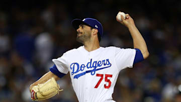 LOS ANGELES, CALIFORNIA - APRIL 13: Scott Alexander #75 of the Los Angeles Dodgers throws a pitch against the Milwaukee Brewers during the sixth inning at Dodger Stadium on April 13, 2019 in Los Angeles, California. (Photo by Yong Teck Lim/Getty Images)