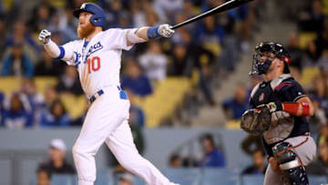 LOS ANGELES, CALIFORNIA - MAY 07: Justin Turner #10 of the Los Angeles Dodgers reacts to his three run homerun in front of Tyler Flowers #25 of the Atlanta Braves, for his third homerun of the game and a 9-0 lead during the eighth inning at Dodger Stadium on May 07, 2019 in Los Angeles, California. (Photo by Harry How/Getty Images)