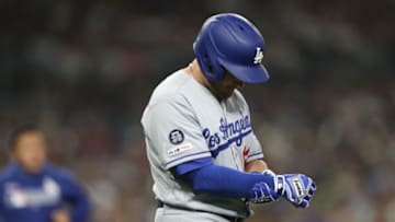 SAN DIEGO, CALIFORNIA - AUGUST 28: Max Muncy #13 of the Los Angeles Dodgers reacts after being hit by a pitch during the fifth inning of a game against the San Diego Padres at PETCO Park on August 28, 2019 in San Diego, California. Muncy left the game after being examined by trainers. (Photo by Sean M. Haffey/Getty Images)