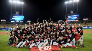 LOS ANGELES, CALIFORNIA - OCTOBER 09: The Washington Nationals celebrate defeating the Los Angeles Dodgers 7-3 in ten innings in game five to win the National League Division Series at Dodger Stadium on October 09, 2019 in Los Angeles, California. (Photo by Harry How/Getty Images)