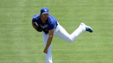 LOS ANGELES, CALIFORNIA - JULY 03: Clayton Kershaw #22 of the Los Angeles Dodgers throws at a summer workout in preparation for a shortened season during the coronavirus (COVID-19) pandemic at Dodger Stadium on July 03, 2020 in Los Angeles, California. (Photo by Harry How/Getty Images)