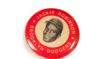 UNDATED: Vintage Jackie Robinson Pin. Brooklyn Dodgers. Small pinback pin shows vintage image of Hall of Fame Brooklyn Dodger Jackie Robinson. (Photo by John Kanuit Photography/Sports Studio Photos/Getty Images)