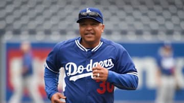 SAN DIEGO, CALIFORNIA - APRIL 06: Los Angeles Dodgers manager Dave Roberts runs on the field before a baseball game against the San Diego Padres at PETCO Park on April 6, 2016 in San Diego, California. (Photo by Denis Poroy/Getty Images)