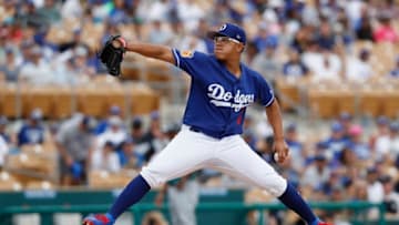 GLENDALE, AZ - MARCH 05: Julio Urias #7 of the Los Angeles Dodgers pitches in the first inning against the Seattle Mariners during the spring training game at Camelback Ranch on March 5, 2017 in Glendale, Arizona. (Photo by Tim Warner/Getty Images)