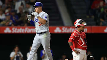 ANAHEIM, CA - JUNE 29: Joc Pederson #31 of the Los Angeles Dodgers reacts to hitting a three-run homerun during the sixth inning as Martin Maldonado #12 of the Los Angeles Angels of Anaheim looks on during the sixth inning of a game at Angel Stadium of Anaheim on June 29, 2017 in Anaheim, California. (Photo by Sean M. Haffey/Getty Images)