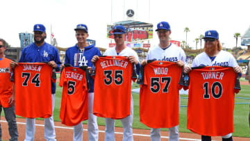 LOS ANGELES, CA - JULY 09: Los Angeles Dodgers players who will be attending the MLB All-Star game hold their jerseys before the game against the Kansas City Royals at Dodger Stadium on July 9, 2017 in Los Angeles, California. L-R: Kenley Jansen