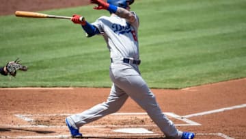 SAN DIEGO, CA - SEPTEMBER 2: Alex Verdugo #61 of the Los Angeles Dodgers hits a single during the second inning in game one of a doubleheader against the San Diego Padres at PETCO Park on September 2, 2017 in San Diego, California. (Photo by Denis Poroy/Getty Images)