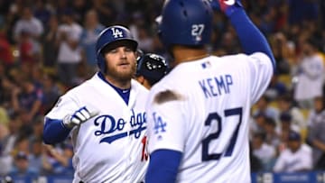LOS ANGELES, CA - JUNE 08: Max Muncy #13 gets a high five from Matt Kemp #27 of the Los Angeles Dodgers after hitting a solo home run in the fifth fifth inning of the game at Dodger Stadium on June 8, 2018 in Los Angeles, California. (Photo by Jayne Kamin-Oncea/Getty Images)
