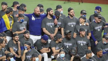 ARLINGTON, TEXAS - OCTOBER 27: The Los Angeles Dodgers pose for a photo after defeating the Tampa Bay Rays 3-1 in Game Six to win the 2020 MLB World Series at Globe Life Field on October 27, 2020 in Arlington, Texas. (Photo by Sean M. Haffey/Getty Images)