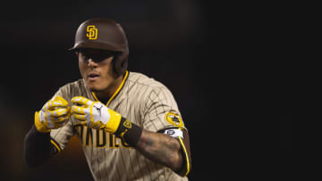 LOS ANGELES, CA - APRIL 22: Manny Machado #13 of the San Diego Padres celebrates an RBI single in the fourth inning against the Los Angeles Dodgers on April 22, 2021 at Dodger Stadium in Los Angeles, California. (Photo by Matt Thomas/San Diego Padres/Getty Images)