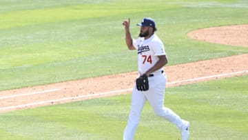 LOS ANGELES, CALIFORNIA - APRIL 11: Kenley Jansen #74 of the Los Angeles Dodgers reacts as he throws the last out to first base to defeat the Washington Nationals, 3-0 during the ninth inning at Dodger Stadium on April 11, 2021 in Los Angeles, California. (Photo by Michael Owens/Getty Images)
