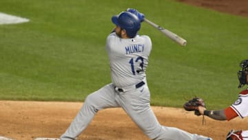 WASHINGTON DC - JULY 01: Max Muncy #13 of the Los Angeles Dodgers hits a grand slam in the fifth inning during a baseball game against the Washington Nationals at Nationals Park on July 1, 2021 in Washington, DC. (Photo by Mitchell Layton/Getty Images)
