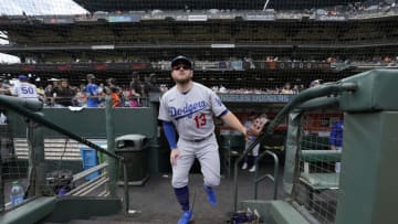 SAN FRANCISCO, CALIFORNIA - JULY 29: Max Muncy #13 of the Los Angeles Dodgers looks on from the dugout steps prior to the start of the game against the San Francisco Giants at Oracle Park on July 29, 2021 in San Francisco, California. (Photo by Thearon W. Henderson/Getty Images)