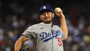 PHOENIX, ARIZONA - JULY 31: Alex Vesia #51 of the Los Angeles Dodgers delivers a pitch against the Arizona Diamondbacks at Chase Field on July 31, 2021 in Phoenix, Arizona. (Photo by Norm Hall/Getty Images)