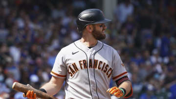 CHICAGO, ILLINOIS - SEPTEMBER 10: Evan Longoria #10 of the San Francisco Giants reacts after striking out against the Chicago Cubs at Wrigley Field on September 10, 2021 in Chicago, Illinois. (Photo by Nuccio DiNuzzo/Getty Images)