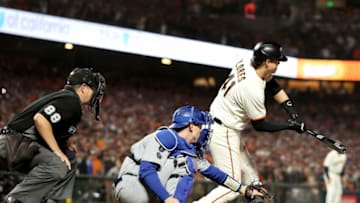 SAN FRANCISCO, CALIFORNIA - OCTOBER 14: Wilmer Flores #41 of the San Francisco Giants strikes out on a checked swing for the final out of the game against the Los Angeles Dodgers during the ninth inning in game 5 of the National League Division Series at Oracle Park on October 14, 2021 in San Francisco, California. The Los Angeles Dodgers beat the San Francisco Giants 2-1. (Photo by Harry How/Getty Images)