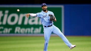 TORONTO, ON - SEPTEMBER 29: Marcus Semien #10 of the Toronto Blue Jays throws to first base during a MLB game against the New York Yankees at Rogers Centre on September 29, 2021 in Toronto, Ontario, Canada. (Photo by Vaughn Ridley/Getty Images)