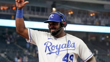 KANSAS CITY, MISSOURI - AUGUST 17: Hanser Alberto #49 of the Kansas City Royals waves to the crowd as he does a post-game interview after their 3-1 win over the Houston Astros at Kauffman Stadium on August 17, 2021 in Kansas City, Missouri. (Photo by Ed Zurga/Getty Images)