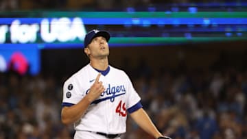 LOS ANGELES, CALIFORNIA - OCTOBER 21: Blake Treinen #49 of the Los Angeles Dodgers reacts to the third out during the sixth inning of Game Five of the National League Championship Series against the Atlanta Braves at Dodger Stadium on October 21, 2021 in Los Angeles, California. (Photo by Harry How/Getty Images)